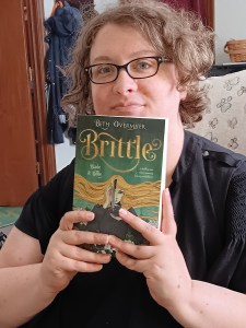Image of me holding my book Brittle (Blade and Bone 1).