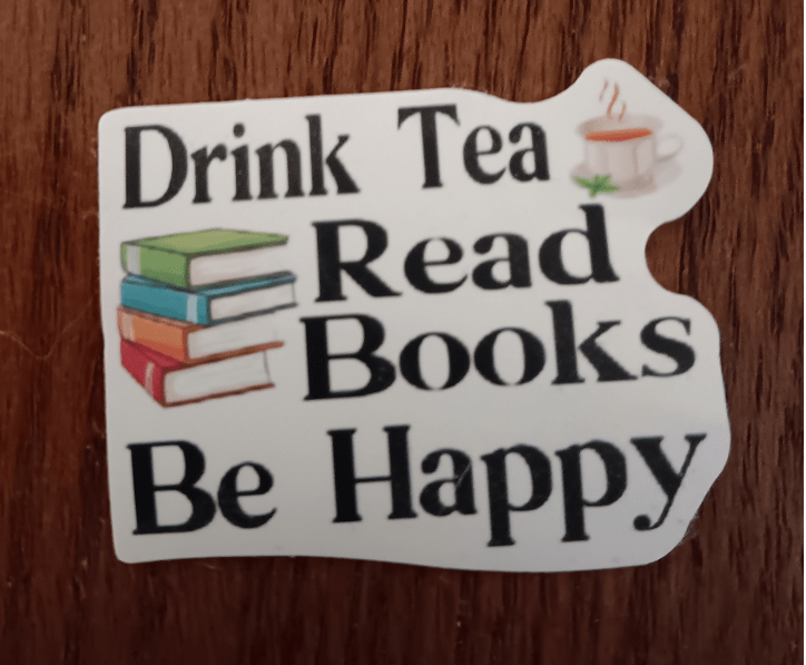 A decal that reads: "Drink tea, read books, be happy."